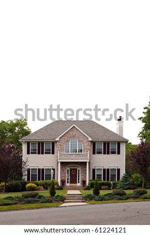 A large luxury home isolated over white.  Plenty of white negative space for your text or design.