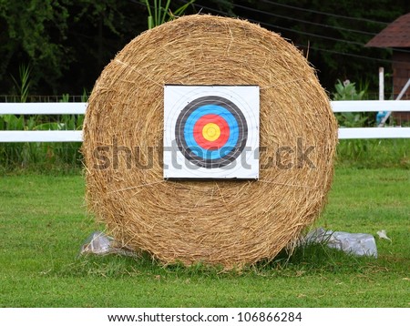 archery target practice made from rolling haystack.