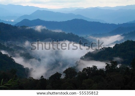 A view from mountains to the valley covered with smog