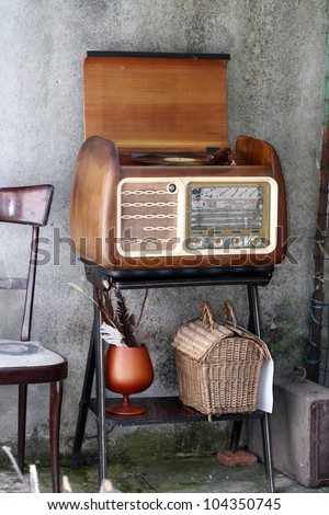 Vintage Radio Turntable cabinet  in a shabby  home interior