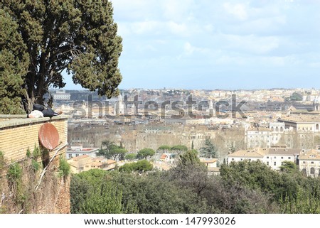 man sleeping on parapet, overview of the city of Rome from Janiculum Hill
