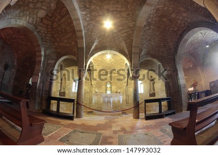 SAN LEO, ITALY - JULY 20: Romaesque interior of the 	crypt  in the VII century Cathedral in a fish-angle view on July 20, 2013 in San Leo, Italy