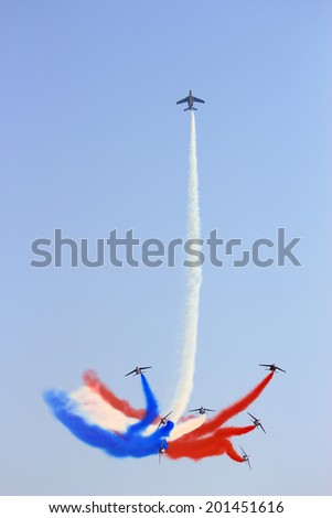 ROME, ITALY - 28 JUNE, 2014:  Patrouille de France make their show at the Rome International Air Show. Event held in Ostia beach
