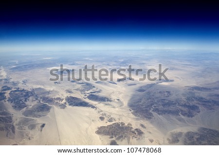 High altitude view of the Earth in space. The desert in the western United States.