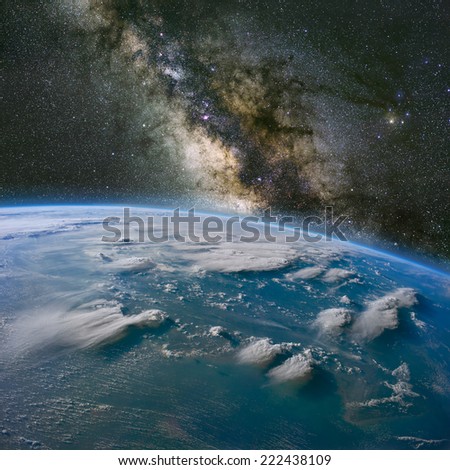 The Milky Way over Borneo with large thunderstorms. Elements of this image furnished by NASA.