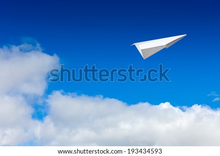 Paper planes in blue sky. Sky background