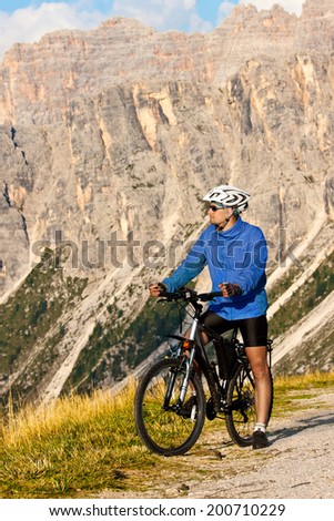 Mountain biking - man on bike, Dolomites, Italy
