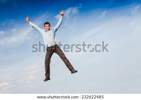 Jumping man in sky