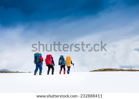 people hiking in beautiful mountain nature landscape