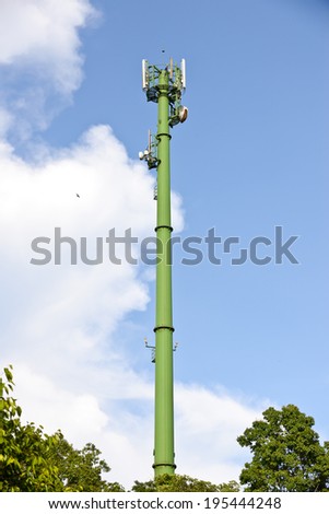 green communication towers in the park