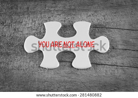 You Are Not Alone - inspirational message on puzzle