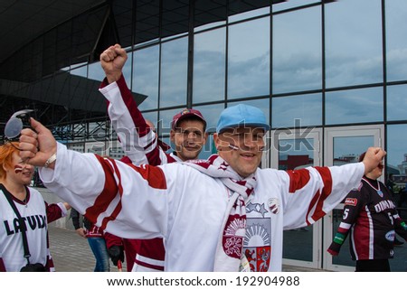 MINSK, BELARUS - MAY 15 - Latvian Fans near Minsk Arena on May 15, 2014 in Belarus. Ice Hockey World Championship (IIHF)