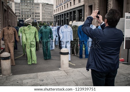 MILAN, ITALY - APRIL 23: art installation by Gianfranco Angelico Benvenuto in Milan on April, 23 2012. Installation '100 Sogni morti sul lavoro' exposed in honor of dead on work in Milan Piazza Duomo