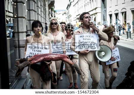 MILAN, ITALY - SEPTEMBER 17: Animalisti Italiani protest on September 17, 2013. Animal right association \'Animalisti Italiani\' protest against furs and fashion, in famous Milan street Monte Napoleone