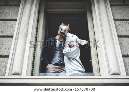 horse man with rabbit woman appeared at the window