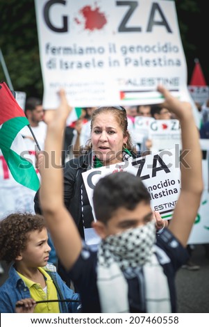 MILAN, ITALY - JULY 26: Pro Palestine manifestation held in Milan on July, 26 2014. People took to the streets to claim  Gaza and Palestine freedom against israel war and bombing