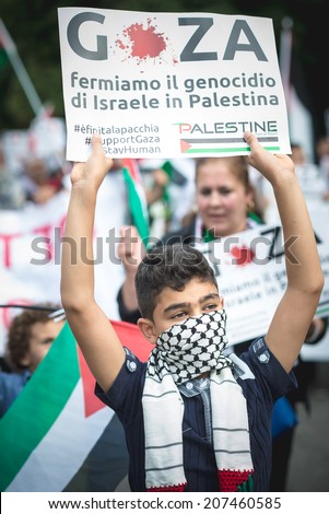 MILAN, ITALY - JULY 26: Pro Palestine manifestation held in Milan on July, 26 2014. People took to the streets to claim  Gaza and Palestine freedom against israel war and bombing
