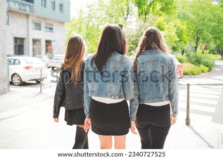 Similar – Foto Bild Drei junge Frauen gehen am Cathedrals Beach in Galizien spazieren.