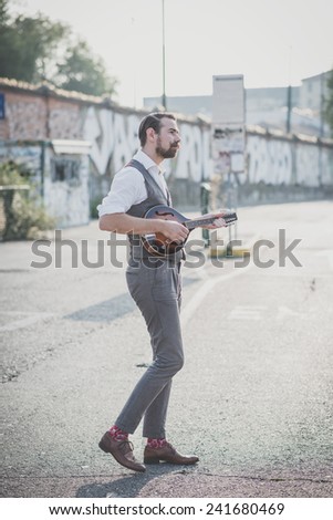 Similar – Image, Stock Photo Man playing mandolin