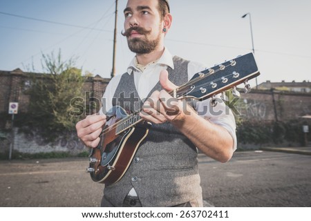 Similar – Image, Stock Photo Man playing mandolin