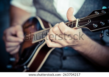 Image, Stock Photo Man playing mandolin