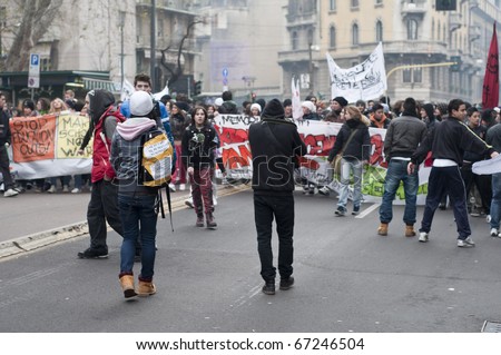 MILAN, ITALY - DECEMBER 14: student demonstration held in Milan December 14, 2010. Students protest against Berlusconi's government and against the new laws on school education minister Gelmini.