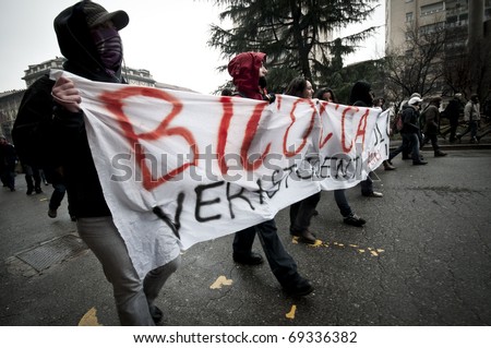 MILAN, ITALY - DECEMBER 22: student demonstration held in Milan December 22, 2010. Students protest against Berlusconi\'s government and against the new laws on school education minister Gelmini.