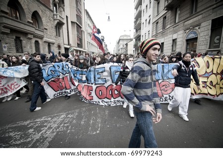 MILAN, ITALY - JANUARY 28: student demonstration held in Milan January 28, 2011. Students protest against Berlusconi's government calling for his resignation from the government.
