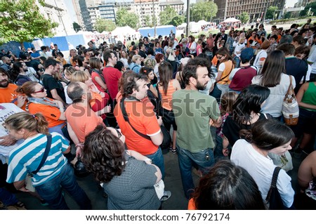 MILAN, ITALY - MAY 8: A group of dog lovers and their pets attend a demonstration against the horrible conditions and atrocities in Spanish kennels on May 8, 2011 in Milan, Italy.