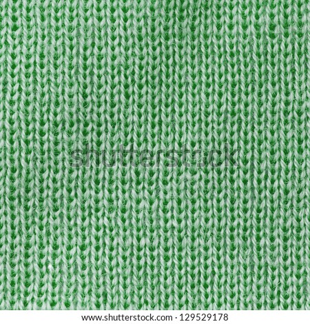 Green knitted fabric texture abstract background