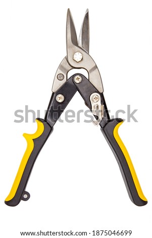 Scissor tin snips cutting sheet metal close-up. Construction, industrial scissors isolated on white background, clipping paths included Stockfoto © 