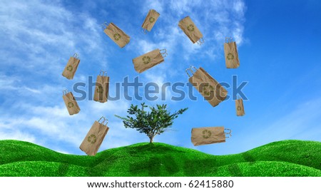 single tree on green field with paper bag, recycle concept