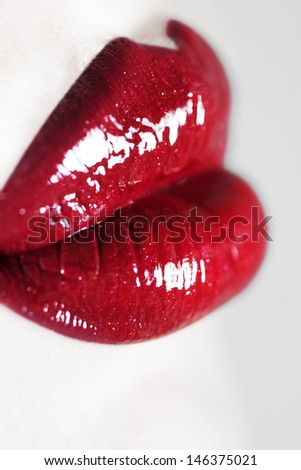 Lips augmentation gone wrong. Very shallow depth of field.
