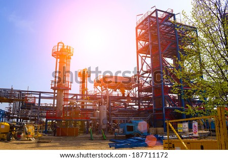 Factory for processing oil with a beautiful sunset, Petroleum Industry, photography