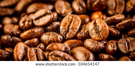 Fragrant fried coffee beans background