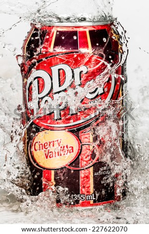 MOSCOW, RUSSIA-APRIL 4, 2014: Can of Dr Pepper Cherry Vanilla soft drink in water Dr Pepper is a soft drink marketed as having a unique flavor. The drink was created in the 1880s.