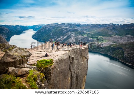 NORWAY- June 22, 2015: Preikestolen or Prekestolen, also known by the English translations of Preacher\'s Pulpit or Pulpit Rock, is a famous tourist attraction in Forsand, Ryfylke, Norway