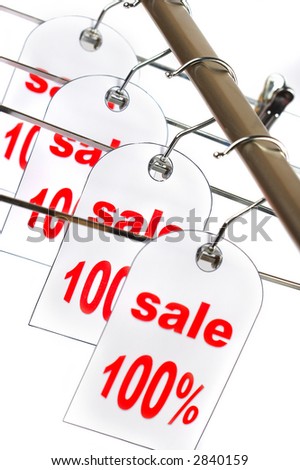 Sale. A hanger with labels on a white background.