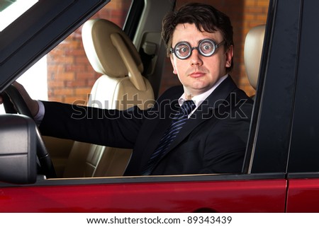 man at the wheel the car