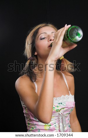 Young Lady Drinking From A Beer Bottle - Very High Resolution Stock ...