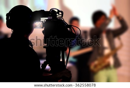Cameraman shooting a live concert Сток-фото © 