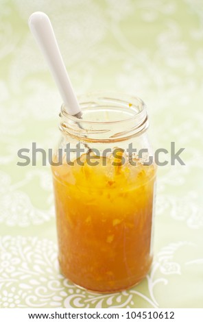 Orange marmalade in glass jar