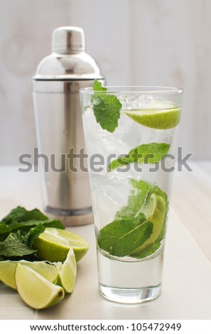 Lime and mint drink with shaker