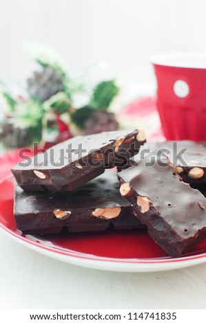 Chocolate bar and christmas decor side view vertical