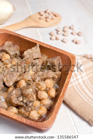 Slow cooked meet with chickpeas and onion vertical