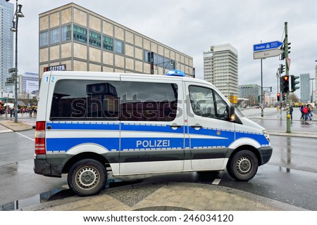 BERLIN, GERMANY-DECEMBER 23, 2014: Police car arrive to Alexanderplatz