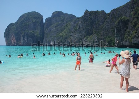 PHI PHI ISLAND, THAILAND - Oct 10, 2014: Unidentified tourists visiting biggest tourist attraction on Phang Nga Bay, October. 10, 2014