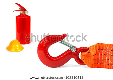 Emergency rope, fire extinguisher and a helmet on a white background