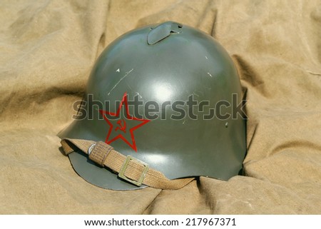 Old Soviet military helmet with a star. Texture, background