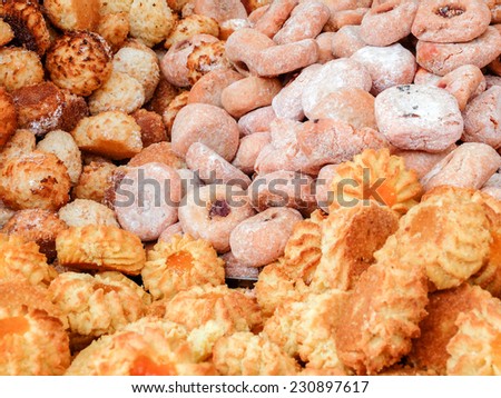 Choice of italian traditional cookies, made with almond and decorated with sugar, jam and almonds